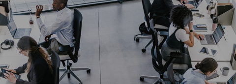 Employees working in open workspaces