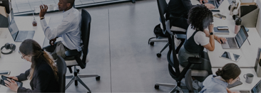 Employees working in open workspaces