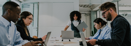 Group of people in a corporate team in an office meeting