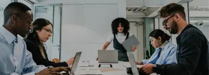 Group of people in a corporate team in an office meeting