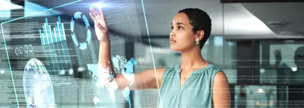 a person in a business suit is touching a digital screen